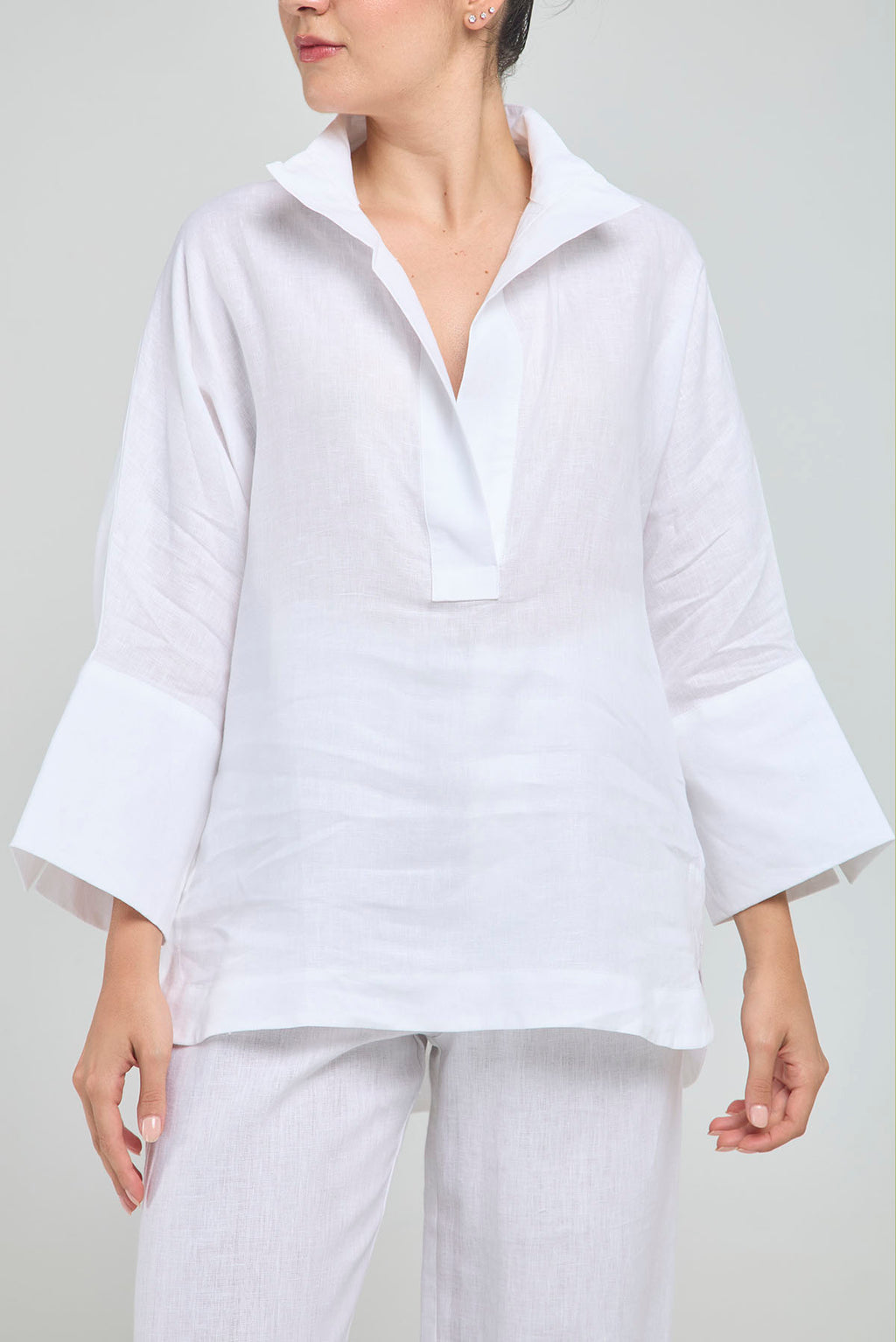 BLUSA LINO PERILLA INTERRUMPIDA  CORTE ATRAS CURVA R