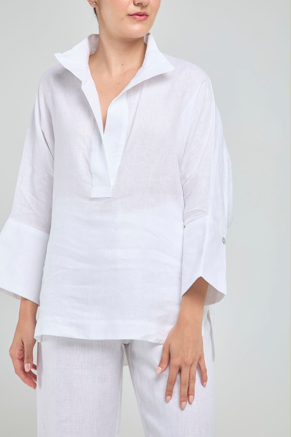 BLUSA LINO PERILLA INTERRUMPIDA  CORTE ATRAS CURVA R