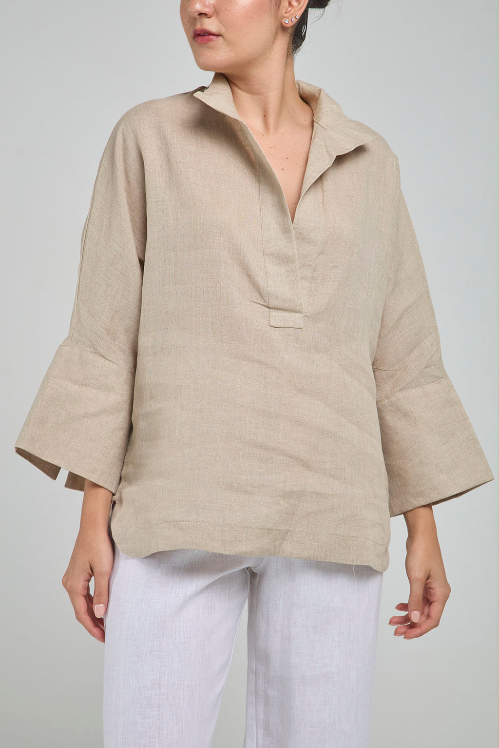 BLUSA LINO PERILLA INTERRUMPIDA  CORTE ATRAS CURVA R