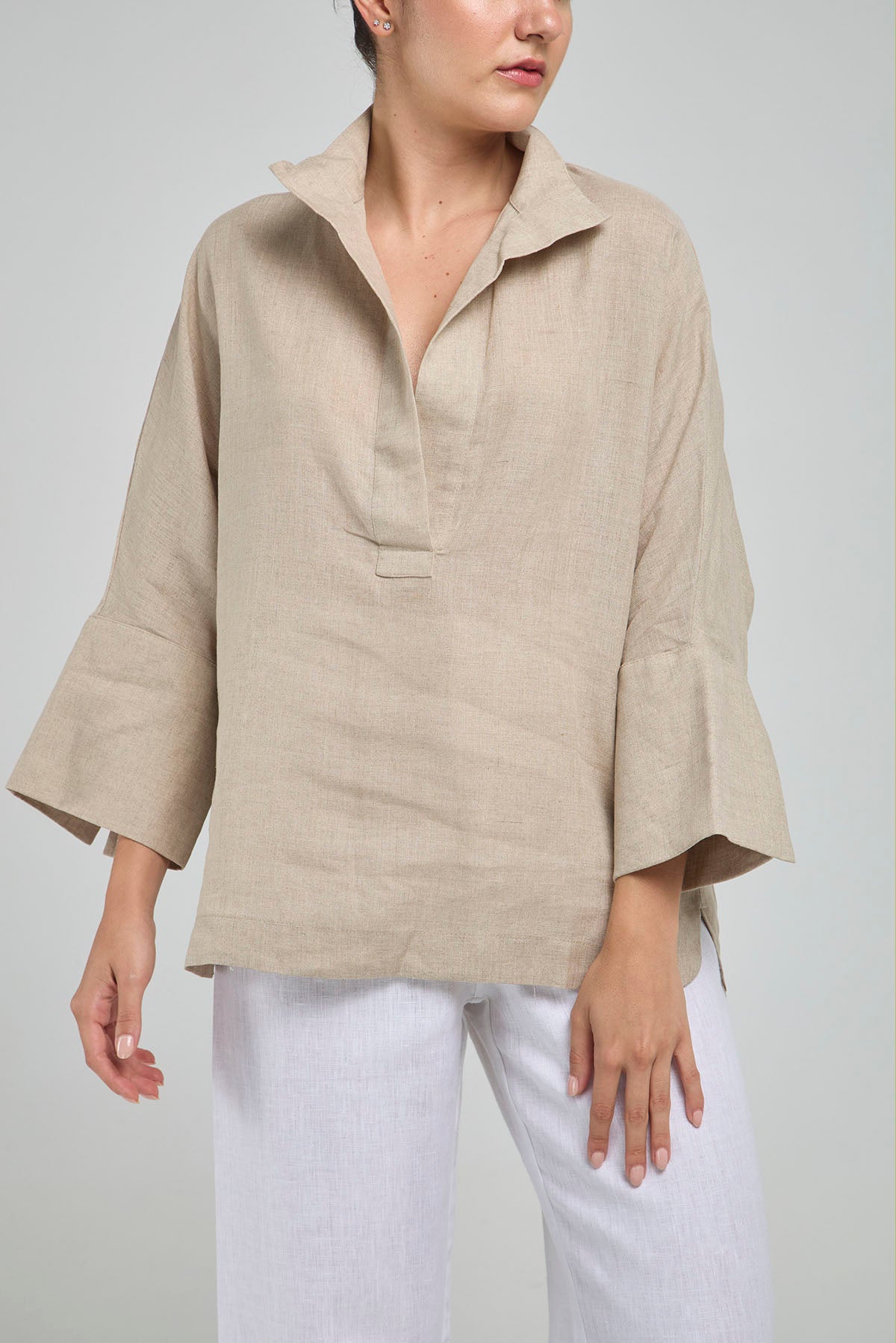 BLUSA LINO PERILLA INTERRUMPIDA  CORTE ATRAS CURVA R