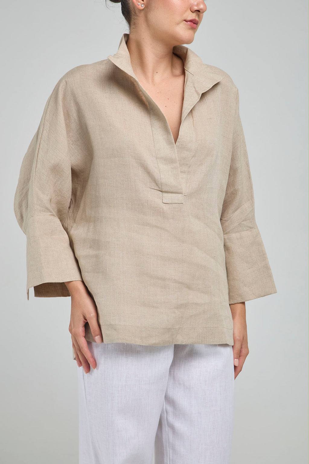 BLUSA LINO PERILLA INTERRUMPIDA  CORTE ATRAS CURVA R