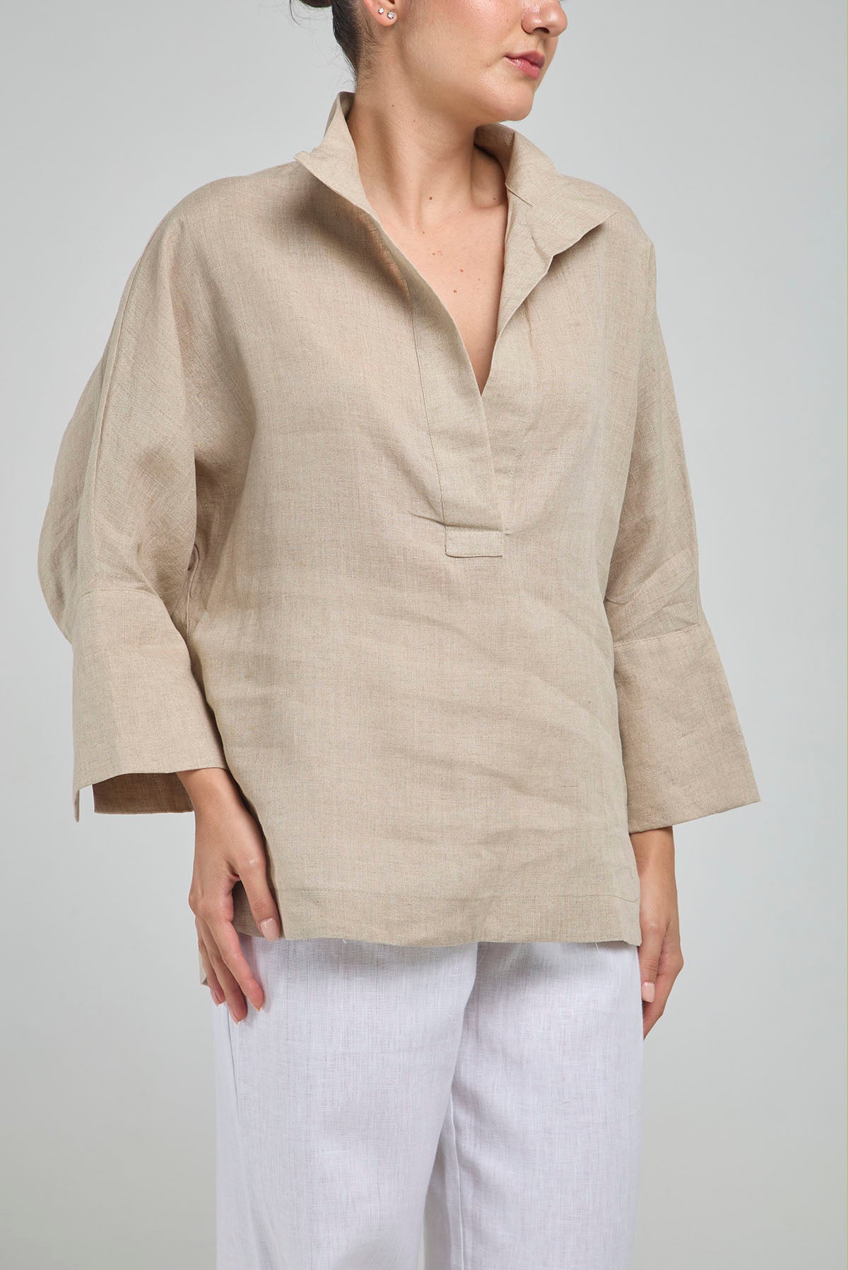 BLUSA LINO PERILLA INTERRUMPIDA  CORTE ATRAS CURVA R