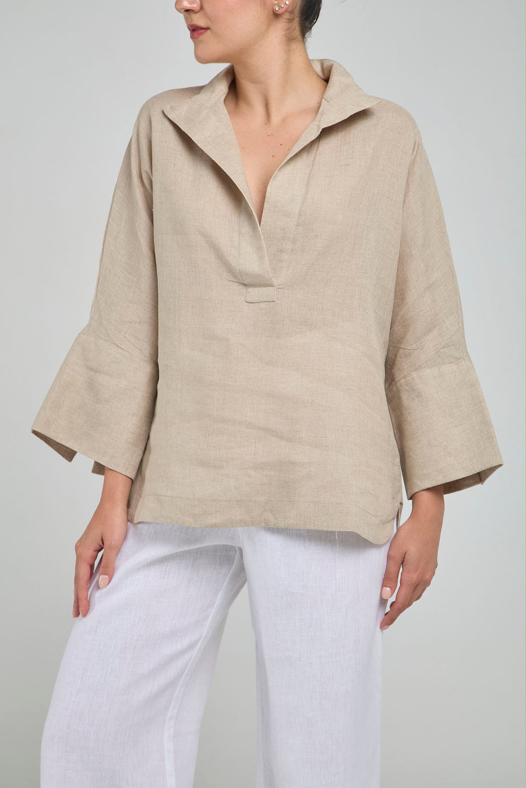 BLUSA LINO PERILLA INTERRUMPIDA  CORTE ATRAS CURVA R