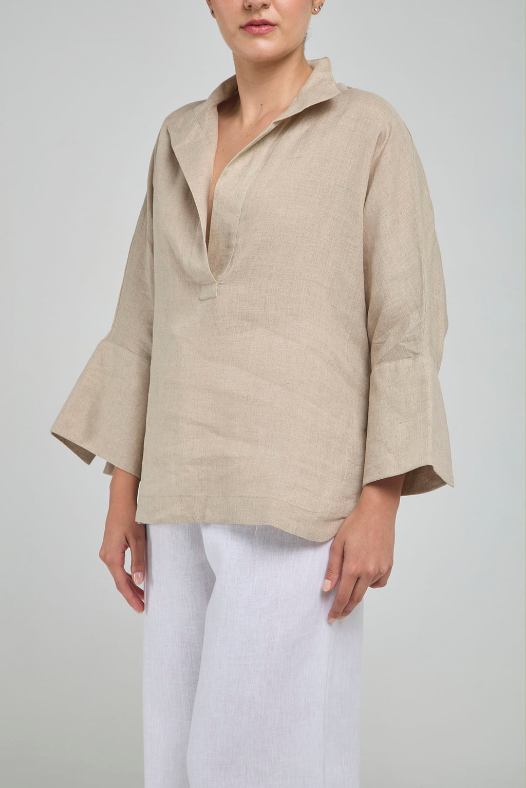 BLUSA LINO PERILLA INTERRUMPIDA  CORTE ATRAS CURVA R