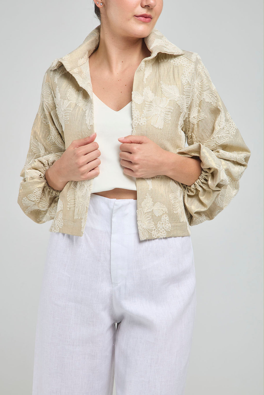 CHAQUETA EN LINO DORADO BORDADA
