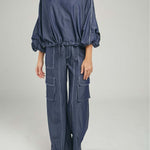 PANTALON VARIOS BOLSILLOS TAPAS LADOS RECOGIDO BOTA