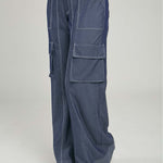 PANTALON VARIOS BOLSILLOS TAPAS LADOS RECOGIDO BOTA