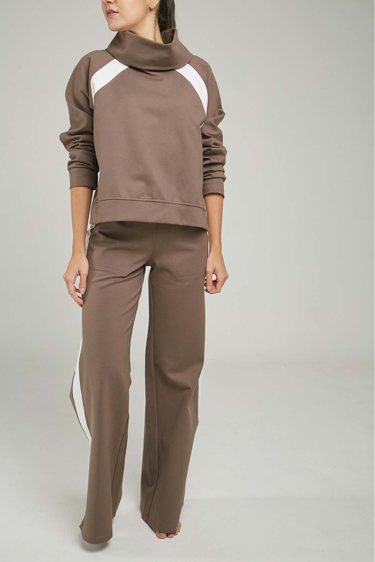 BUSO LISTA DIAGONAL SISA CUELLO DRAPEADO CIERRE LADOS  ML