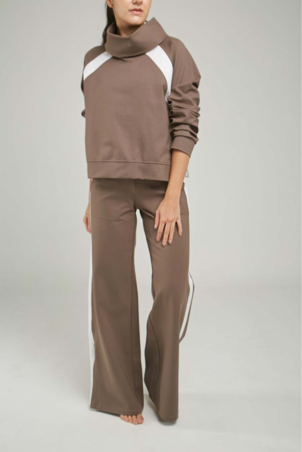 BUSO LISTA DIAGONAL SISA CUELLO DRAPEADO CIERRE LADOS  ML