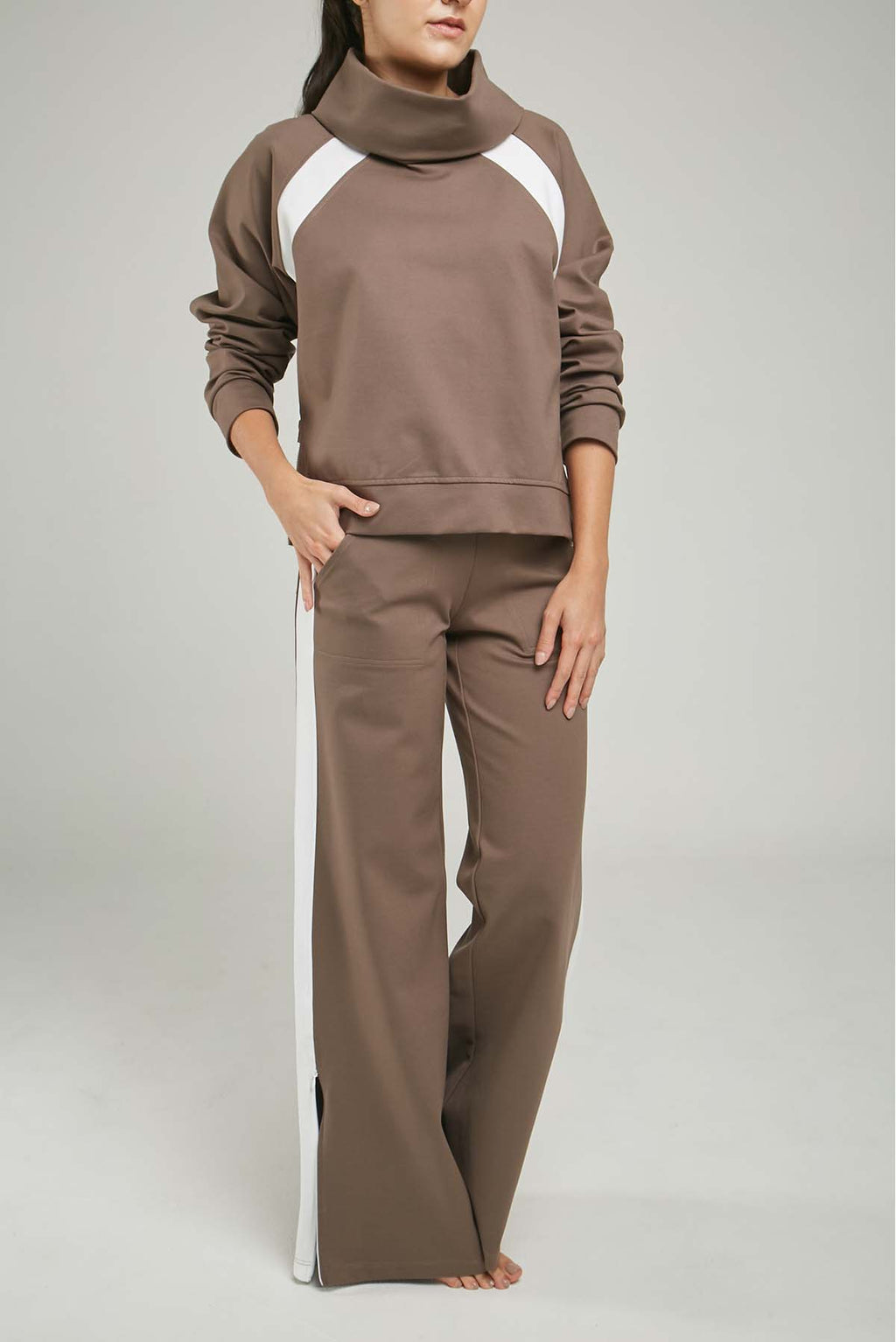 BUSO LISTA DIAGONAL SISA CUELLO DRAPEADO CIERRE LADOS  ML