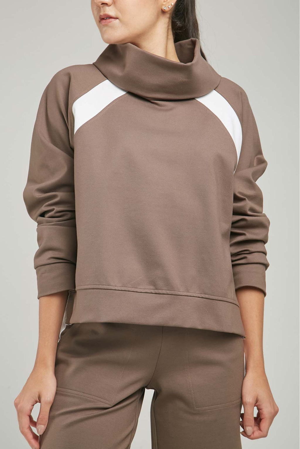 BUSO LISTA DIAGONAL SISA CUELLO DRAPEADO CIERRE LADOS  ML