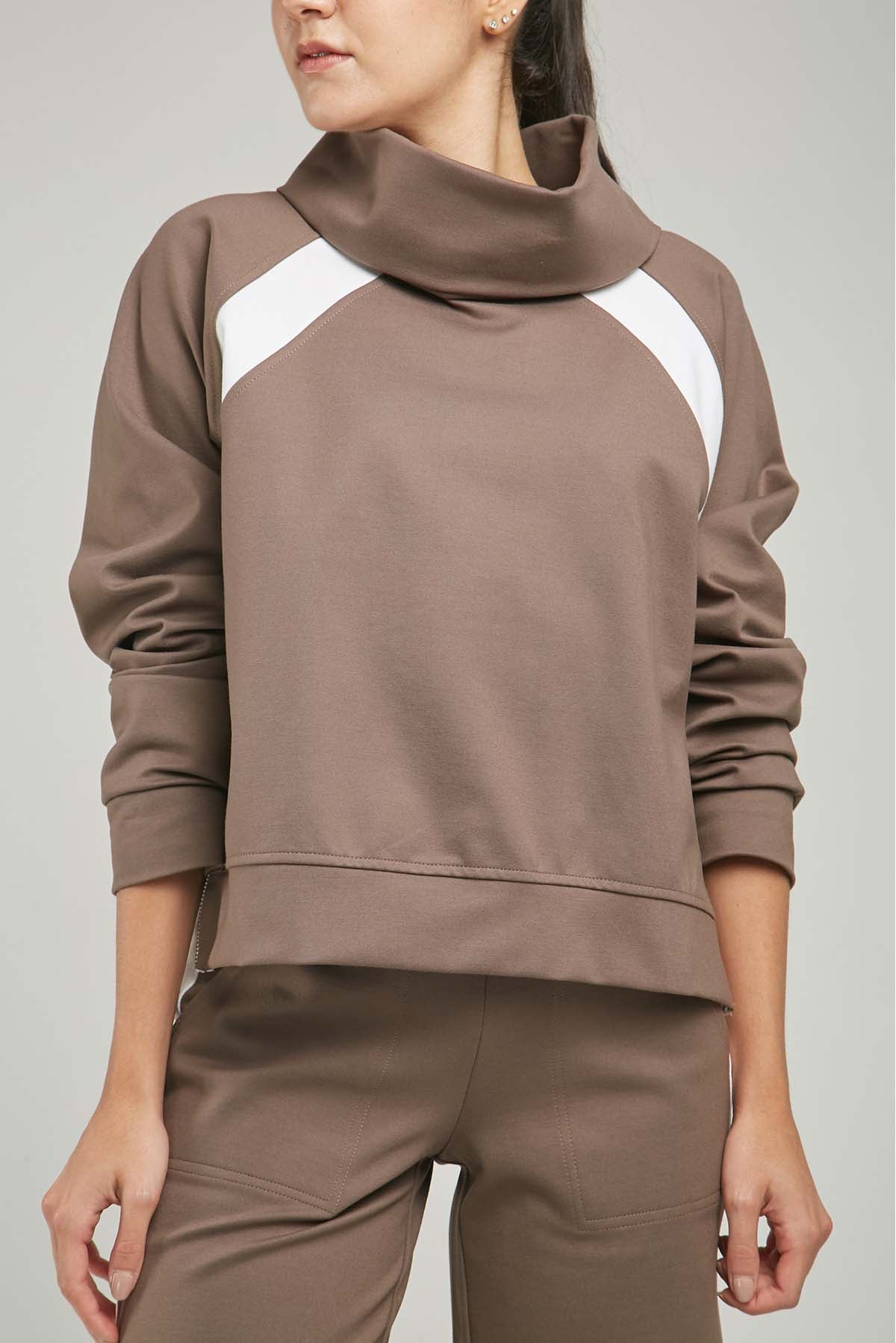 BUSO LISTA DIAGONAL SISA CUELLO DRAPEADO CIERRE LADOS  ML