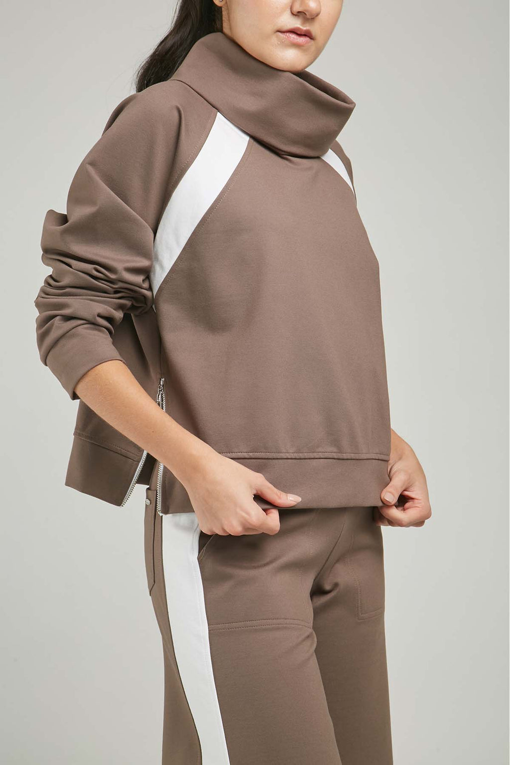 BUSO LISTA DIAGONAL SISA CUELLO DRAPEADO CIERRE LADOS  ML