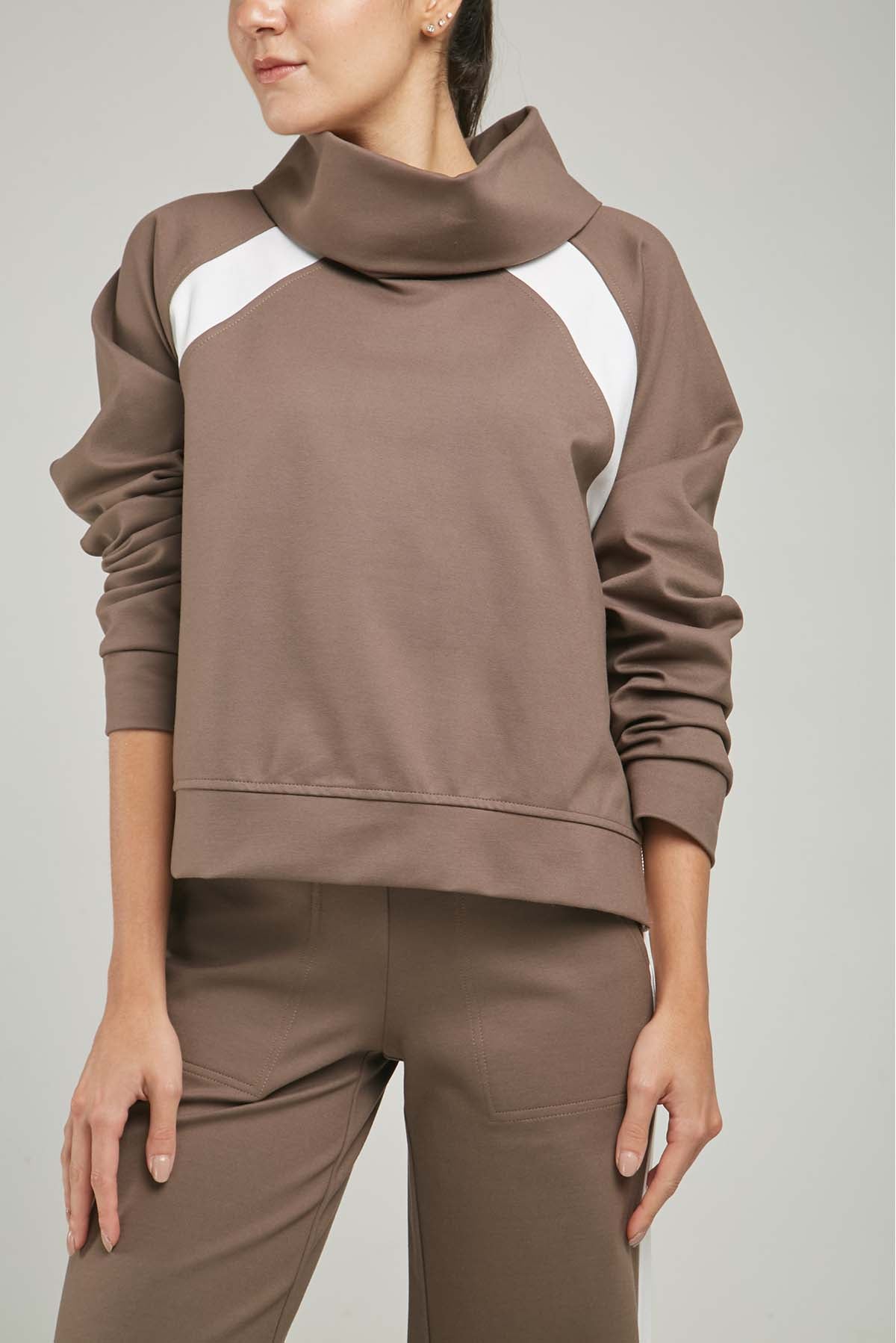 BUSO LISTA DIAGONAL SISA CUELLO DRAPEADO CIERRE LADOS  ML