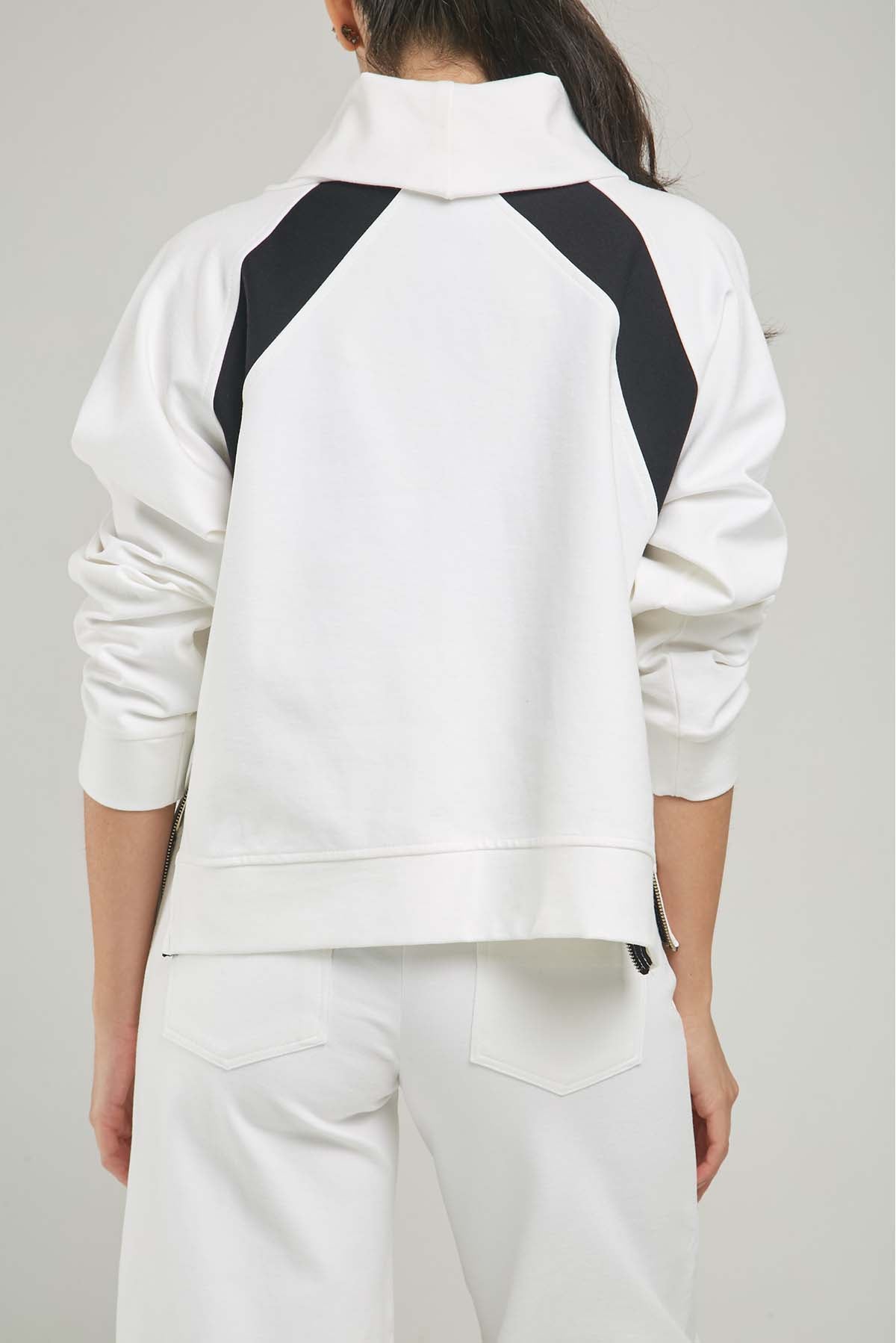 BUSO LISTA DIAGONAL SISA CUELLO DRAPEADO CIERRE LADOS  ML