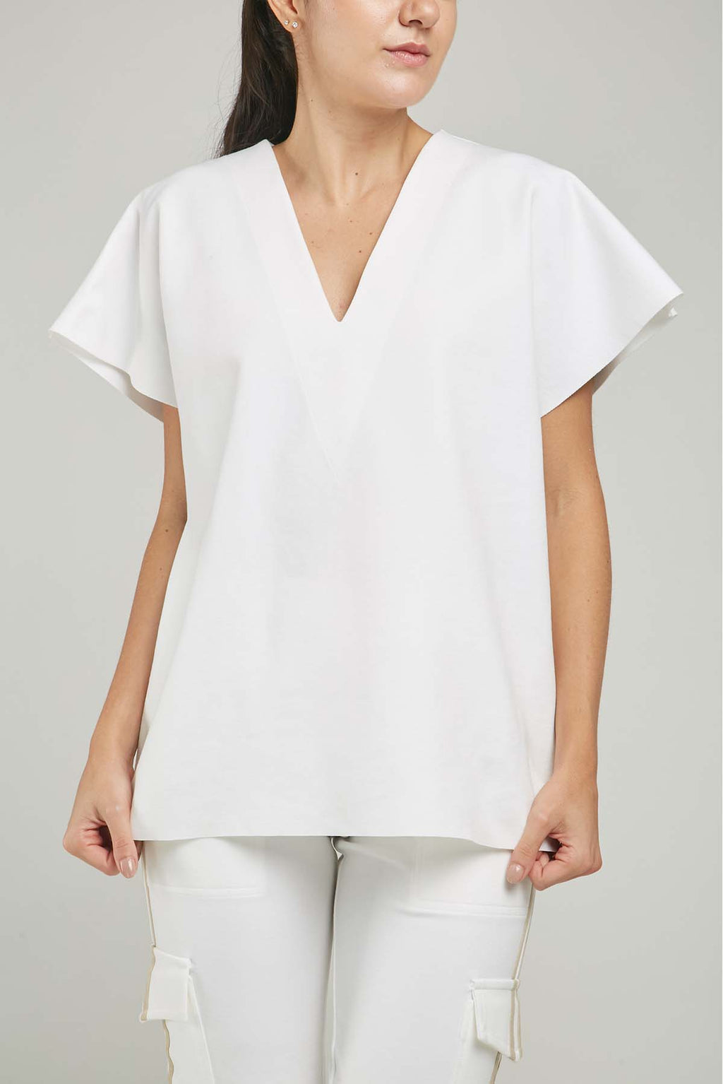 CAMISETA TIPO CAPA MANGA RODADA CUELLO V