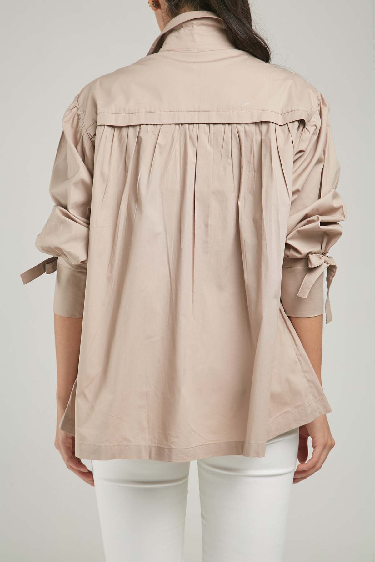 BLUSA LISTA MOÑO HORIZONTAL ADELANTE PUÑO PRENSE A