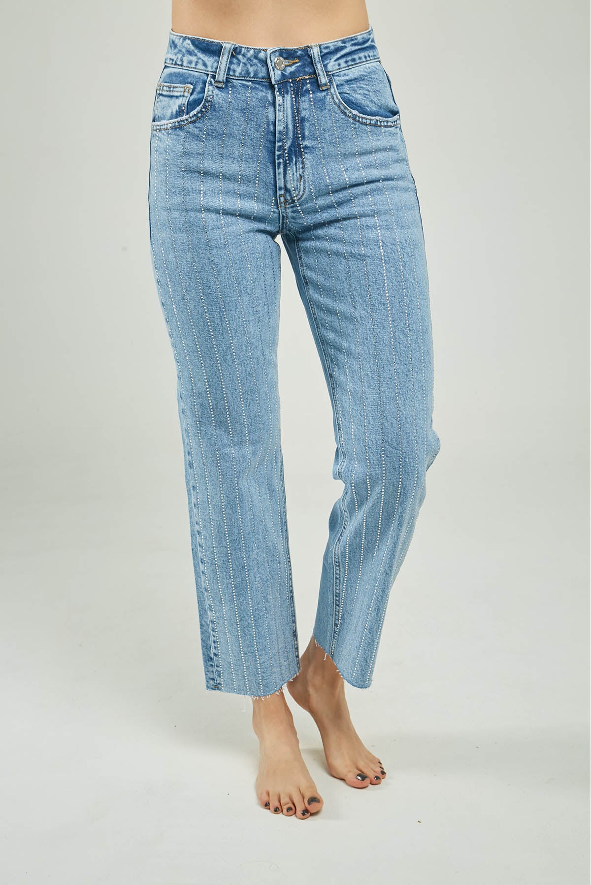 PANTALON JEAN CHISPAS ILERAS RUEDO DESFLECADO