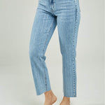 PANTALON JEAN CHISPAS ILERAS RUEDO DESFLECADO