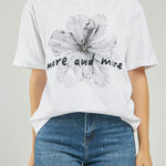 CAMISETA ESTAMPADO  FLOR NEGRA ADELANTE CANUTILLO  MC
