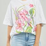 CAMISETA ESTAMPADO ADELANTE FLOR FUCSIA CHISPAS  C/R MC