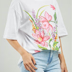 CAMISETA ESTAMPADO ADELANTE FLOR FUCSIA CHISPAS  C/R MC