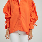 BLUSA PERILLA ESCONDIDA PUÑO AMARRAR CORTO ATRA
