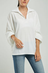 BLUSA TELA REPUJADA PERILLA INTERRUMPIDA  CUELLO CAMISERO  M/LAR